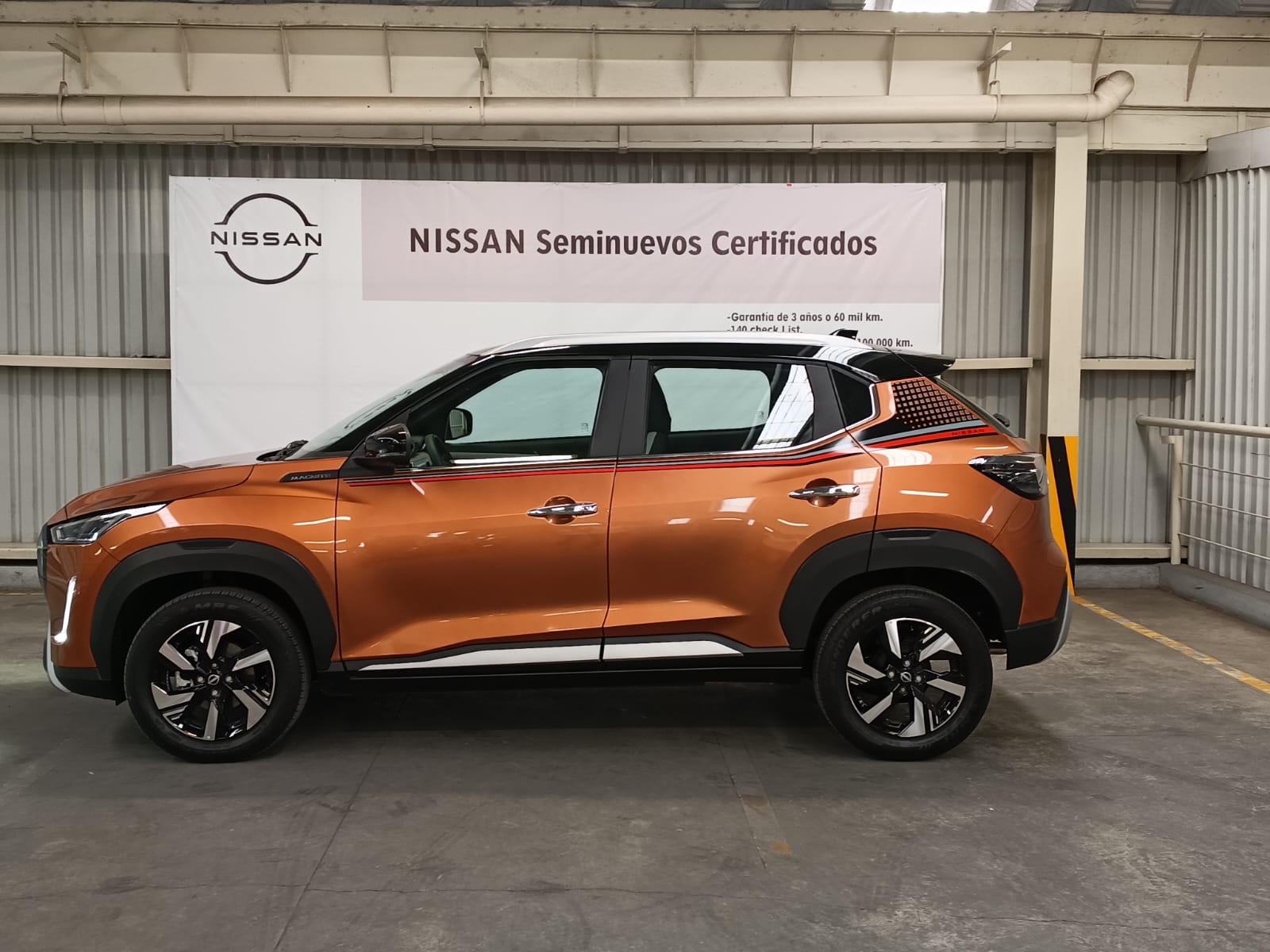 2025 Nissan MAGNITE — rear three-quarter view