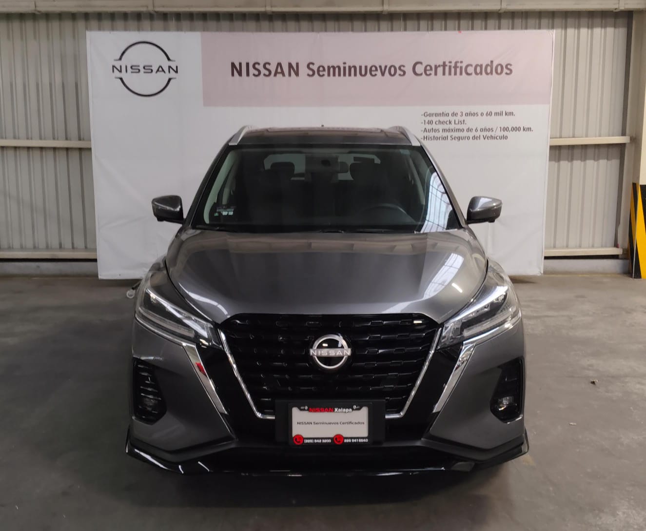 2024 Nissan KICKS 5P EXCLUSIVE E-POWER HEV L31.2 AUT in Gris — front three-quarter view